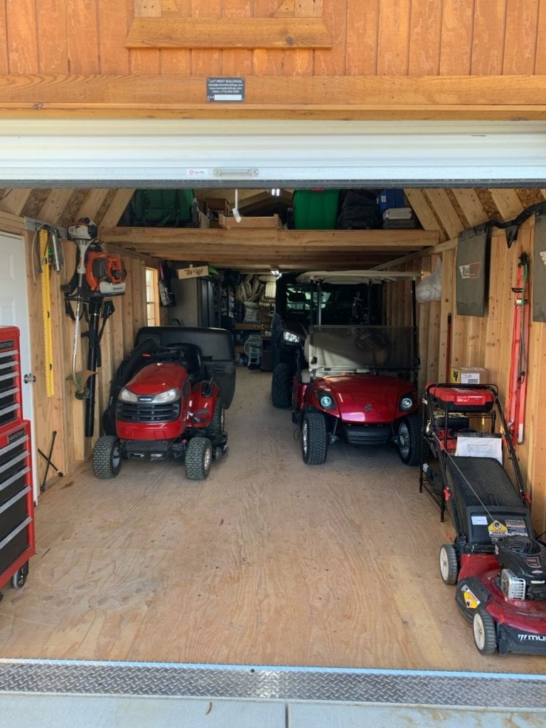 Lawn Mowers and Garden Tools Stored in Shed