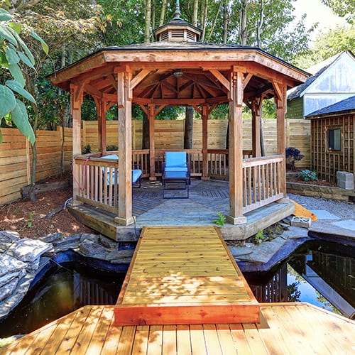 Fabulous gazebo with a pond in the back yard.